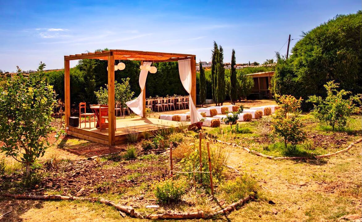 Timber pergola and deck set in an Algarve garden for an outdoor celebration